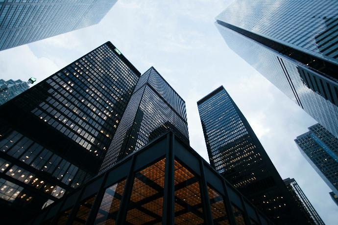 low angle photo of city high rise buildings during daytime